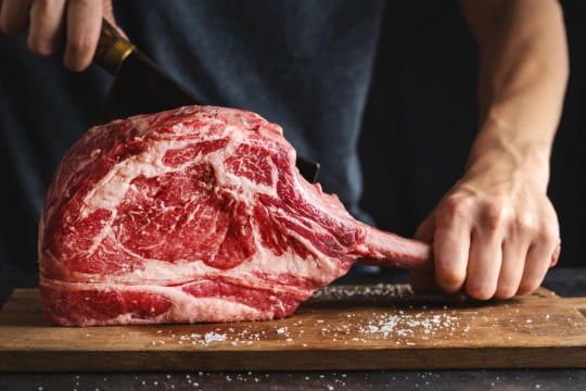 Butcher Cutting Beef